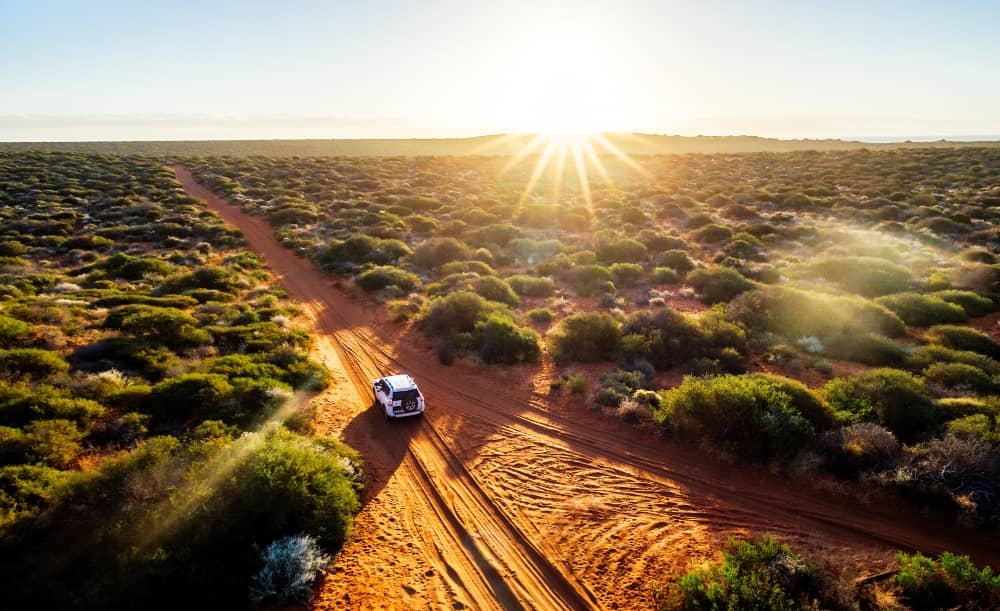 Driving on unpaved road, Australian outback.