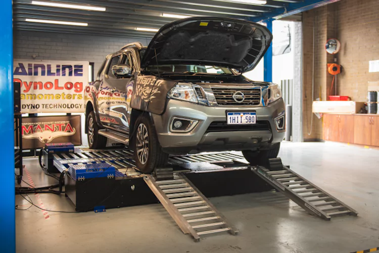 Vehicle being prepared for dyno tuning at Elite Tune