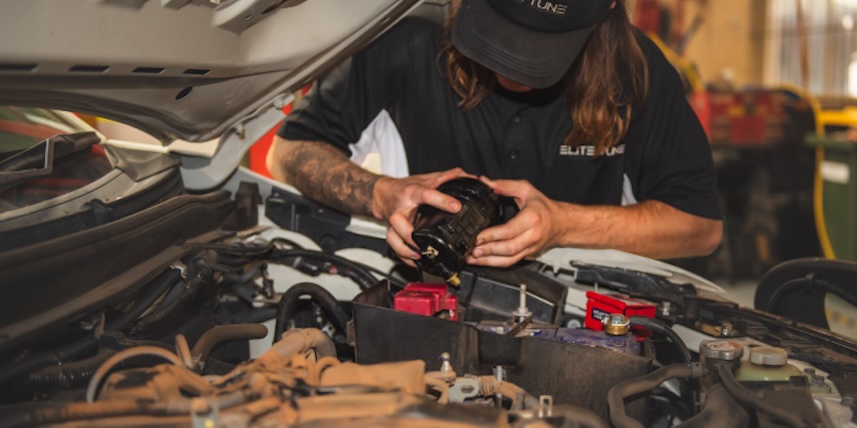 Mechanic showing how to clean diesel injectors
